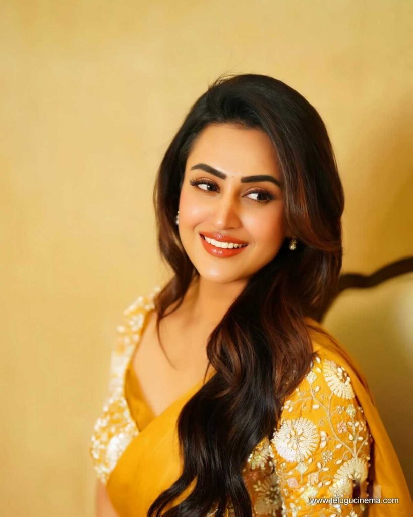 Archana Iyer in a yellow Saree
