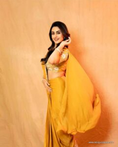 Archana Iyer in a yellow Saree