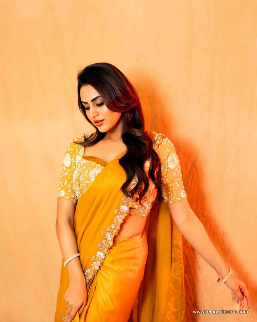 Archana Iyer in a yellow Saree
