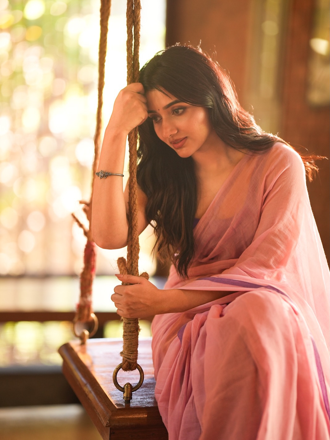 Mirnaa in a peach saree