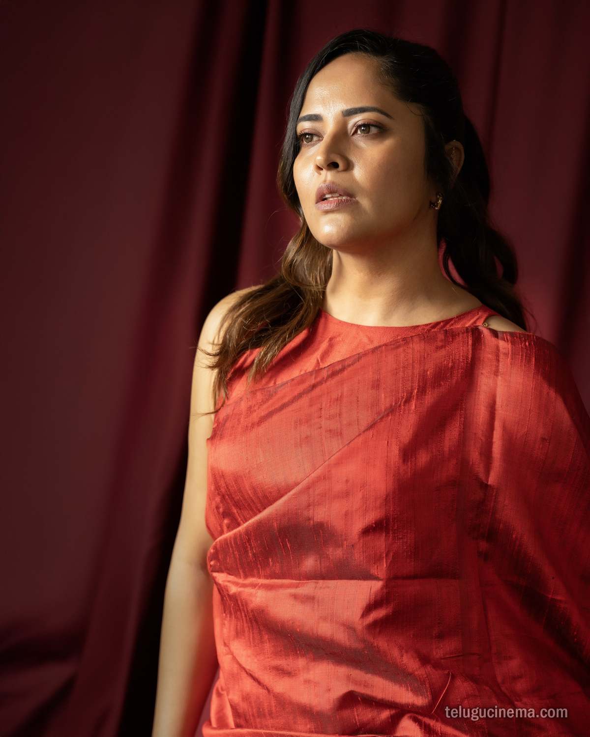 Anasuya Bharadwaj exudes elegance in a striking red saree