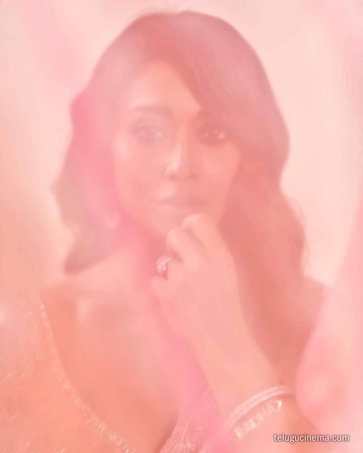 Shriya Saran looks graceful in a pastel pink saree