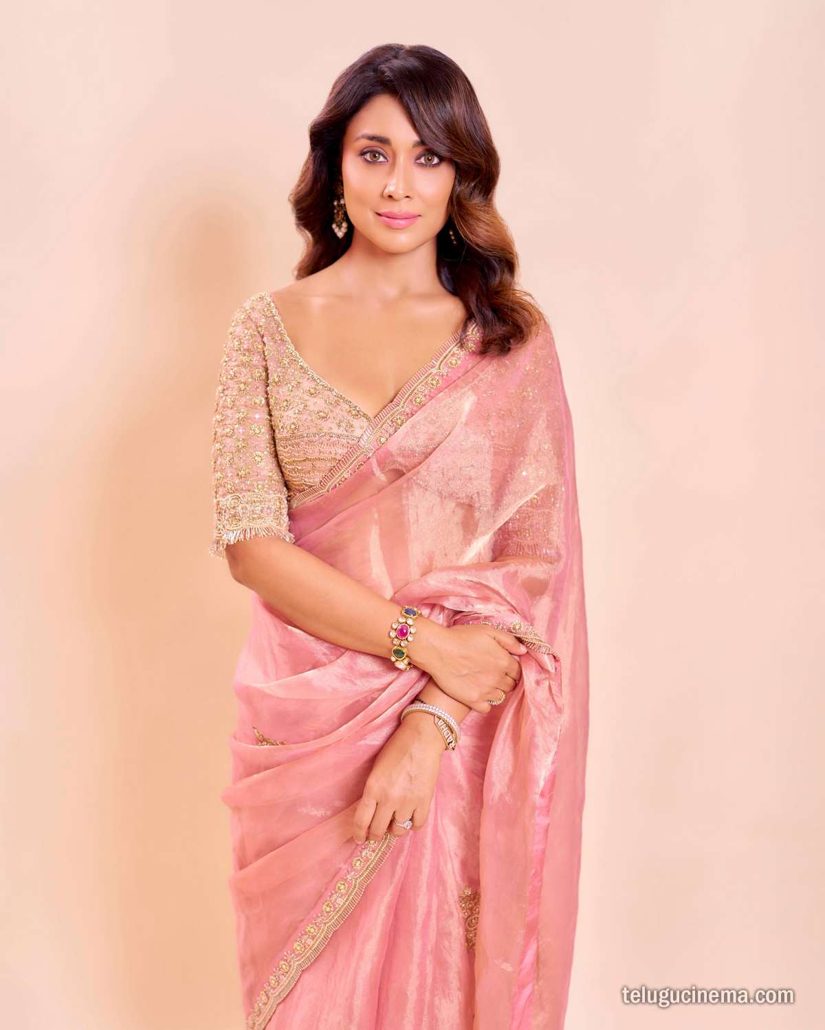 Shriya Saran looks graceful in a pastel pink saree