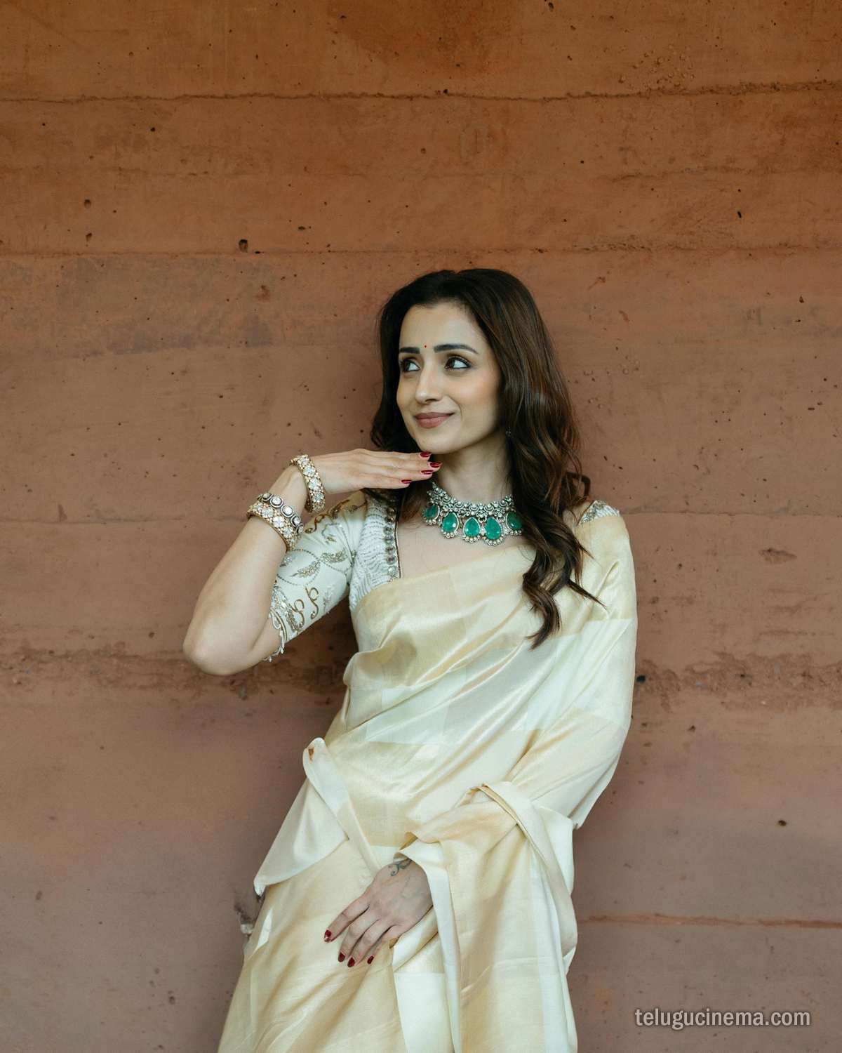 Trisha Krishnan looks graceful in a classic cream saree